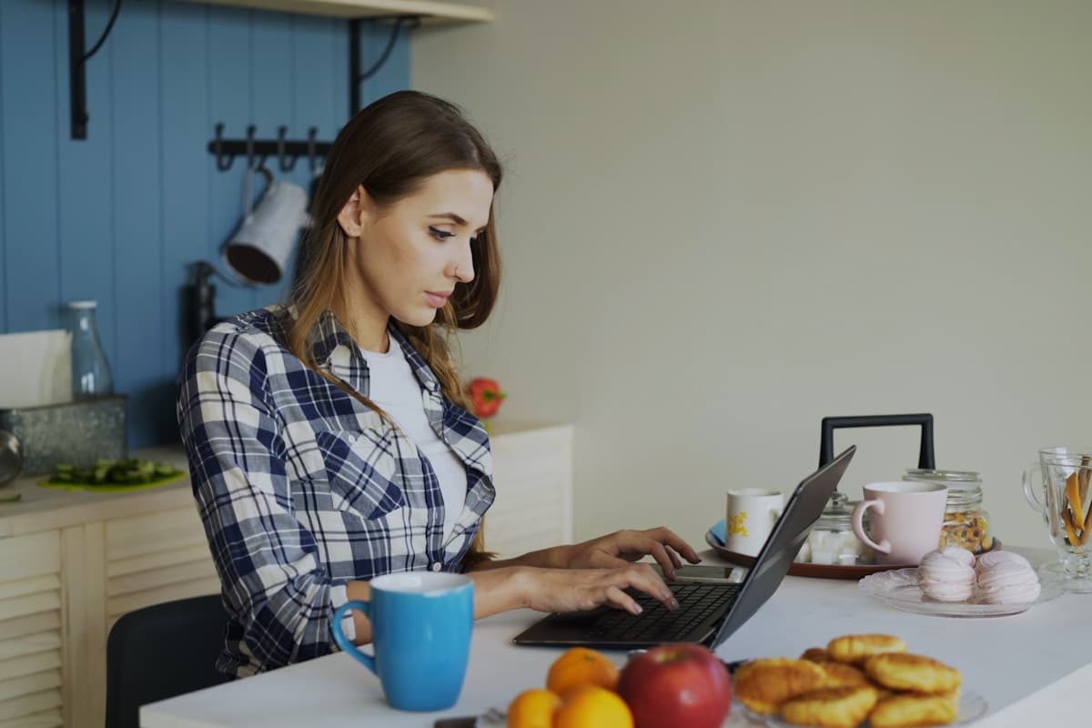 Person reviewing their Phi Longevity health report at home