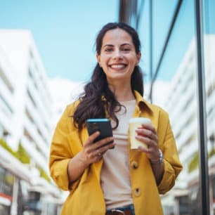 Woman checking her Phi health score on her phone